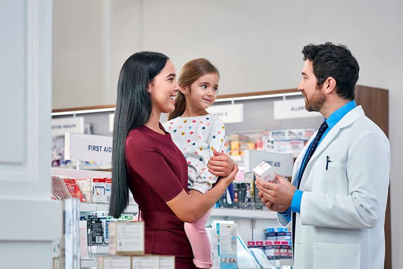 https://www.iqvia.com/-/media/iqvia/images/modules/brandworld/797_consumer-health_custom_mother-and-child-with-pharmacist-smiling.jpg?mw=800&hash=5A2378220EA51D3D06E9233434871E56